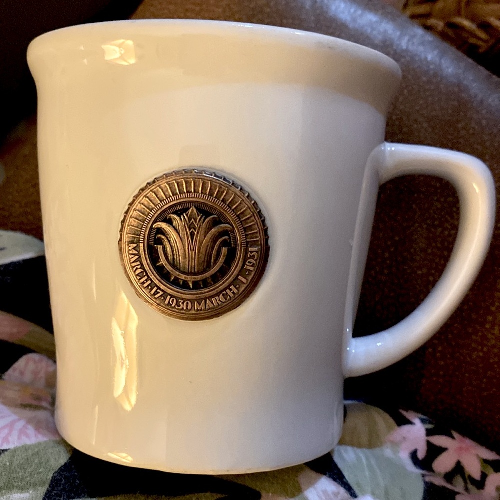 This is an Empire State Bldg Mug Commemorating the Construction between 1930-31.